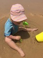 Toddler playing with toys at the beach  - PhotoDune Item for Sale
