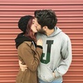 A young couple tenderly kiss after moving from another state and putting their things in storage! - PhotoDune Item for Sale