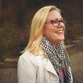 Young woman happily smiles while wearing fashionable fall clothes - PhotoDune Item for Sale