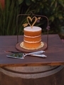 Mini wedding cake with a gold heart on top - PhotoDune Item for Sale