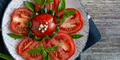 side dish ripe red tomatoes sliced with oil, oregano and garlic - PhotoDune Item for Sale