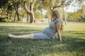 Pregnant mother sitting on the grass in the park #debb_a/motherhood - PhotoDune Item for Sale