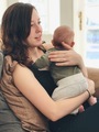 Young mother holding her infant son - PhotoDune Item for Sale