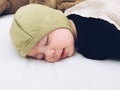 Sleeping baby with a tiny little grin - PhotoDune Item for Sale