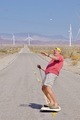 Open road, desert road trip surfing. The heat makes you do fun things to cool off - PhotoDune Item for Sale