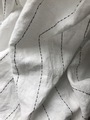 Linen fabric stitched with black thread makes a great background  - PhotoDune Item for Sale