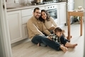 Happy family with a little boy in their new home apartment, mother father and their son at cozy home - PhotoDune Item for Sale