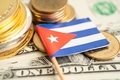 Cuba flag on stack of coin money, finance banking business. - PhotoDune Item for Sale