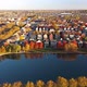 Colorful Fall Neighborhood In Suburbs Sunset Lake Drone Shot - VideoHive Item for Sale