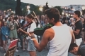 Music festival in Pragua. The street musicians play the violin on the Charles Bridge in Prague - PhotoDune Item for Sale