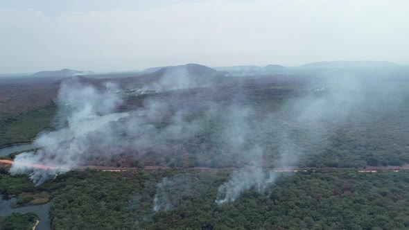 Smoke over forest in Pantanal Brazil aerial shot