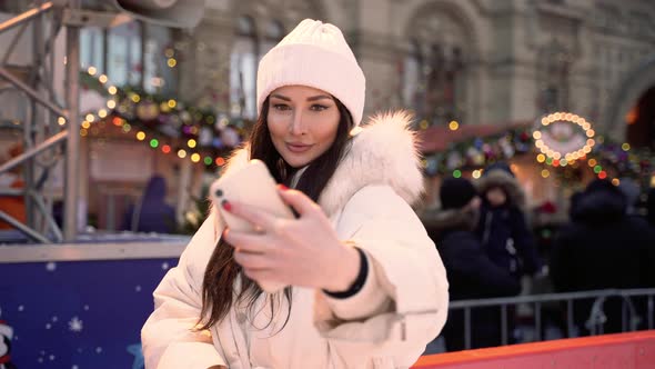 Christmas Ice Rink with a Brunette Girl