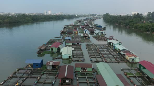 drone tripod  shot over floating fish farming community in Bien Hoa on the Dong Nai river, Vietnam o