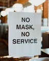 No mask, no service sign on a glass barrier in a restaurant during pandemic - PhotoDune Item for Sale