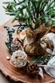 Neutral colors with winter holiday board centerpiece, pine cone, decorative small tree, blueberries - PhotoDune Item for Sale