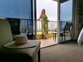 Condominium living, woman on the balcony  - PhotoDune Item for Sale