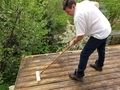 Man cleaning wooden deck  - PhotoDune Item for Sale