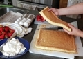 Baker working with bisquit dough to make a strawberry shortcake  - PhotoDune Item for Sale