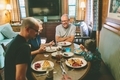 A family eating breakfast together. - PhotoDune Item for Sale