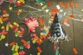 Confetti and party hats on the floor after a New Years Eve Party - PhotoDune Item for Sale