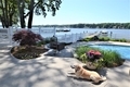 Backyard living space on the lake with swimming pool - PhotoDune Item for Sale