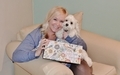 Woman and her cute pet excited about receiving a gift  - PhotoDune Item for Sale
