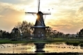 Dutch windmill landscape at sunset - PhotoDune Item for Sale