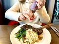 Woman putting fresh ground pepper on food NY strip steak fresh green beans & loaded mashed potatoes  - PhotoDune Item for Sale