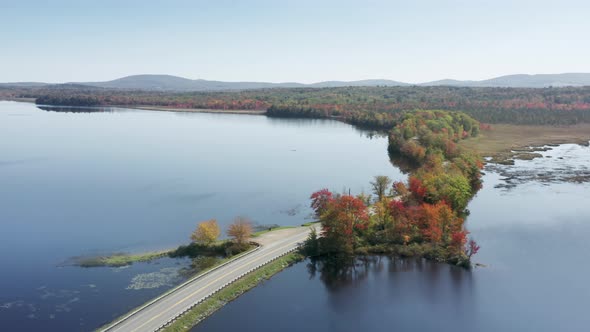 Picturesque Motorway Stretching Along Crystal Clear Lake