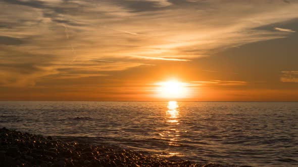 Beautiful Sunset Over the Sea in the Clouds