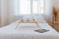 coffee table with tea on the bed in the bedroom - PhotoDune Item for Sale