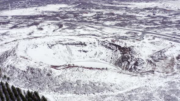 Snowy Volcanic Kerid Crater on the Golden Circle of Iceland Seen From the Air