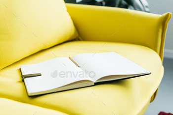 Close up view of empty textbook pages with pencil