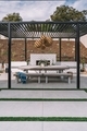 Beautiful View of an Outdoor Dining Area with Table and Gazebo - PhotoDune Item for Sale