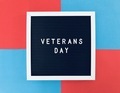 Veterans Day sign board on blue and red background to salute our dearest veterans  - PhotoDune Item for Sale