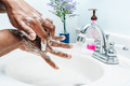 Washing hands, African American or black man at home practicing good hygiene  - PhotoDune Item for Sale