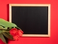 Valentines day backgound with red tulips and empty blackboard for text. Greeting card - PhotoDune Item for Sale