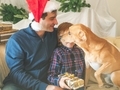Dad and son in santa caps and dog on christmas - PhotoDune Item for Sale