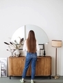 Girl with long hair at the mirror in a cozy and stylish apartment interior - PhotoDune Item for Sale