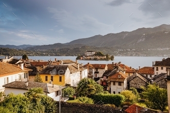 at, calm, cities, europe, foothills, giulio, green, harbor, hills, historic, house, houses, island, islands, isle, italia, italian, italian cities, Italy, lake, lakes, landscape, mountain, mountains, nature, orta, outdoor, panoramic, peaceful, piedmont, piemonte, romantic, san, san giulio, sky, streets, summer, sunny, sunset, tourism, tourists, Travel, view, village, water
