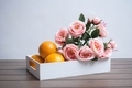 White box with oranges and pink roses  - PhotoDune Item for Sale