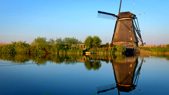 Windmills at Kinderdijk in Holland on Sunset. Netherlands