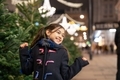 Pretty little girl outdoor in a city center at Christmas - PhotoDune Item for Sale