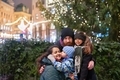 Happy multinational family outdoor in a city center at Christmas - PhotoDune Item for Sale