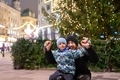 Little boy and his father outdoor in a city center at Christmas time - PhotoDune Item for Sale