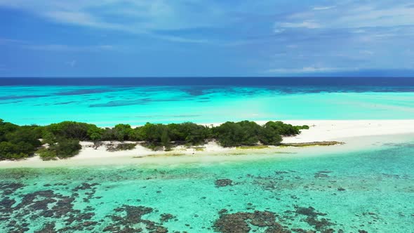 Aerial flying over texture of luxury lagoon beach journey by shallow sea and white sandy background 