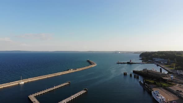 Flight over the sea to the lighthouse.