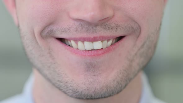 Close Up of Smiling Young Man