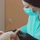 The manicurist carefully processes the nails and prepares them for painting. - VideoHive Item for Sale