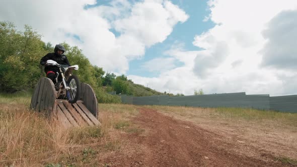 Motorcyclist Training on Off-Road Track with Obstacles